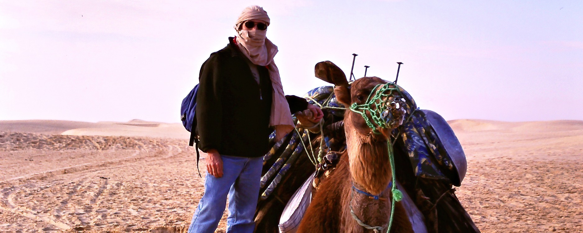 Steve and Hogar at the start of the camel trek in Douz, Tunisia-SAI-focus_1875x750
